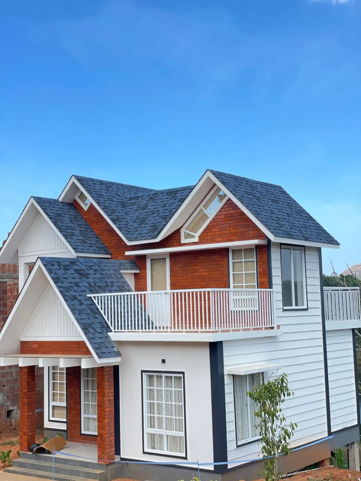 Modern two-storey house elevation — representative home construction reference